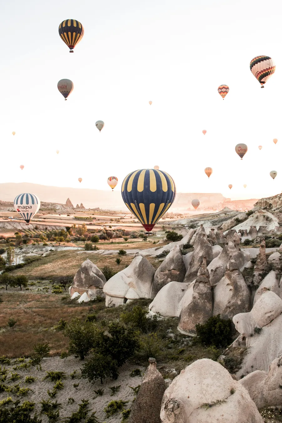 Hot air balloons over the rock valleys of Cappadocia